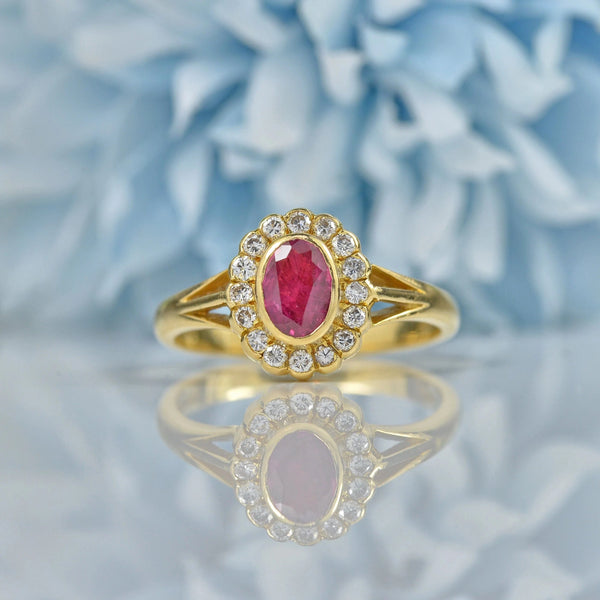 Ellibelle Jewellery VINTAGE RUBY & DIAMOND 18CT GOLD OVAL HALO RING