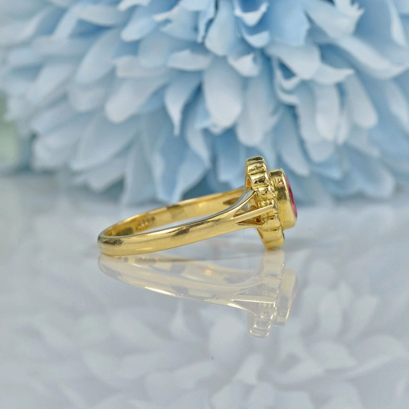 Ellibelle Jewellery VINTAGE RUBY & DIAMOND 18CT GOLD OVAL HALO RING