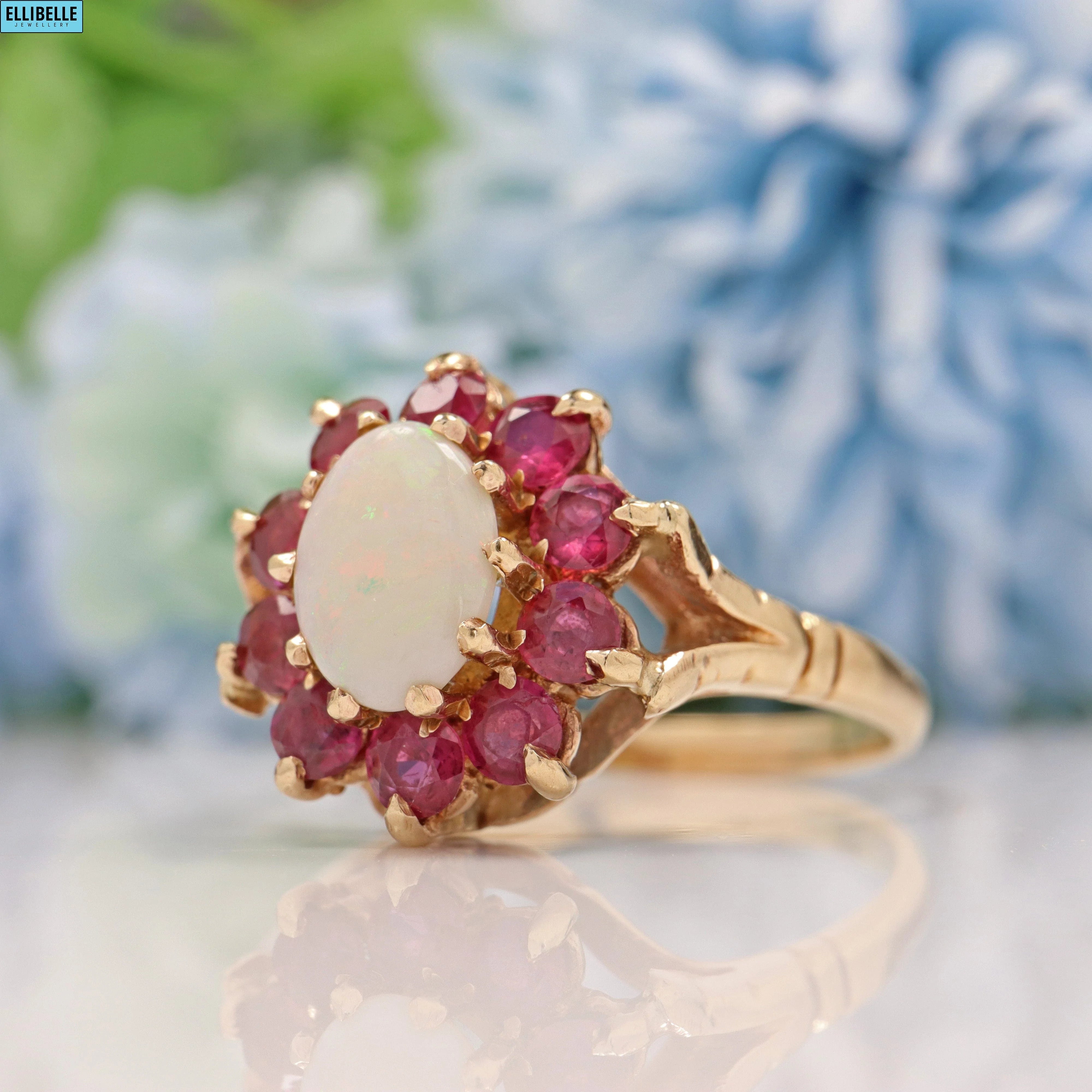VINTAGE RUBY & OPAL 9CT GOLD HALO CLUSTER RING