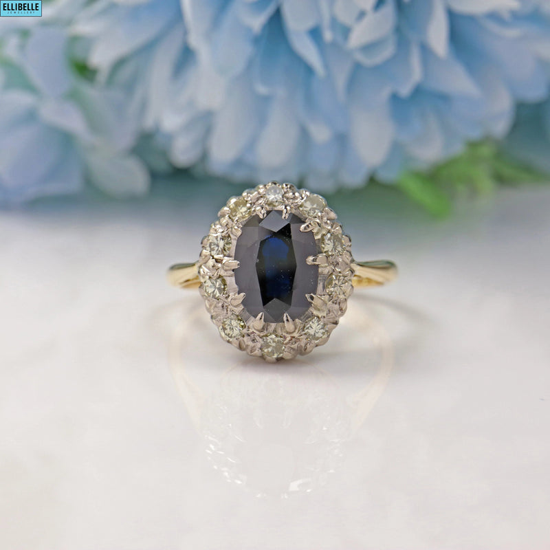 VINTAGE SAPPHIRE & DIAMOND 18CT GOLD HALO CLUSTER RING