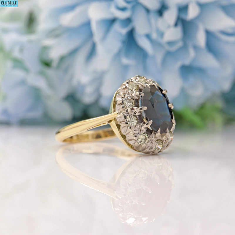 VINTAGE SAPPHIRE & DIAMOND 18CT GOLD HALO CLUSTER RING