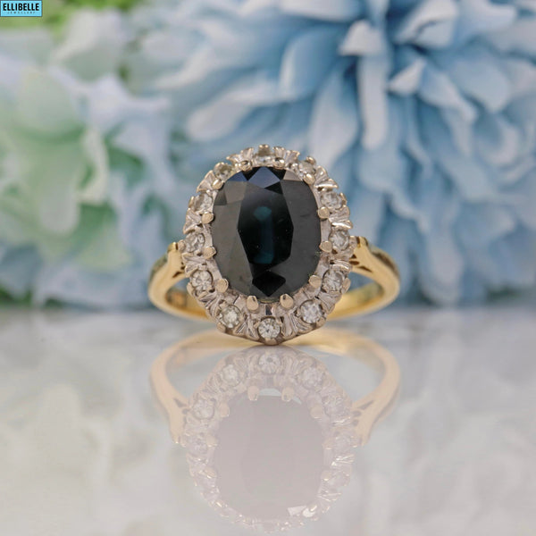 VINTAGE SAPPHIRE & DIAMOND 18CT GOLD HALO RING