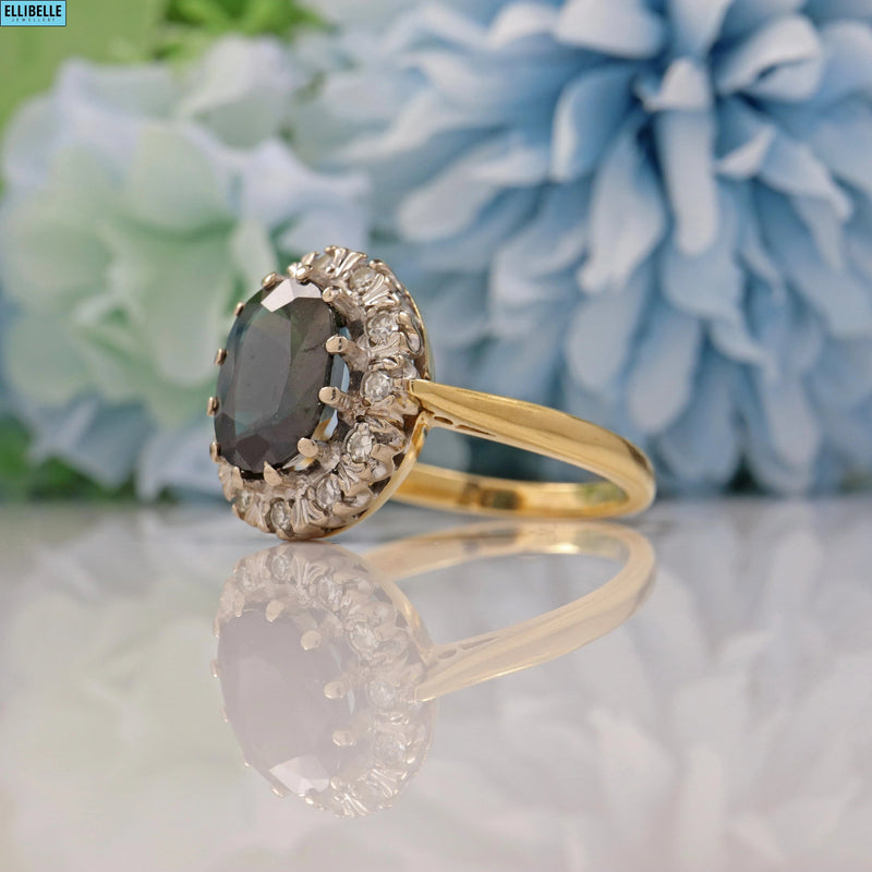 VINTAGE SAPPHIRE & DIAMOND 18CT GOLD HALO RING