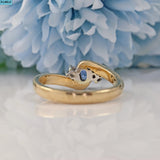 VINTAGE SAPPHIRE & DIAMOND 9CT GOLD BYPASS RING - 1990